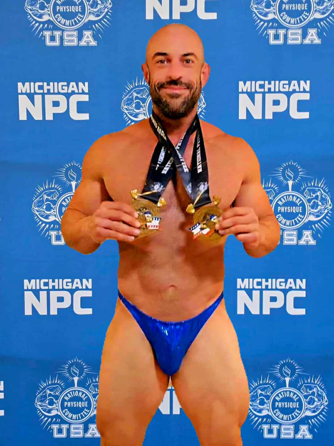 Stage front pose blue trunks